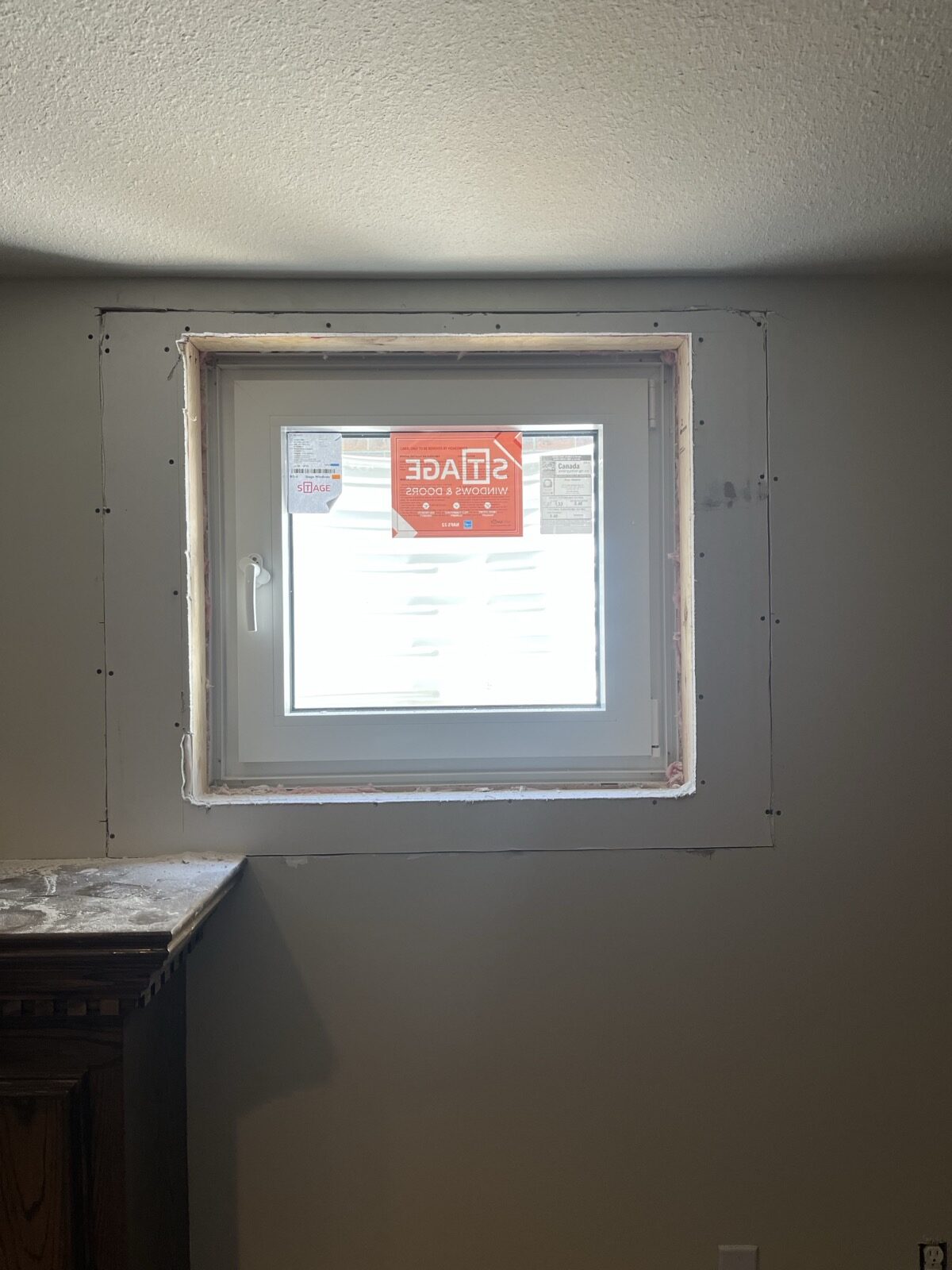 Newly installed basement window from the interior