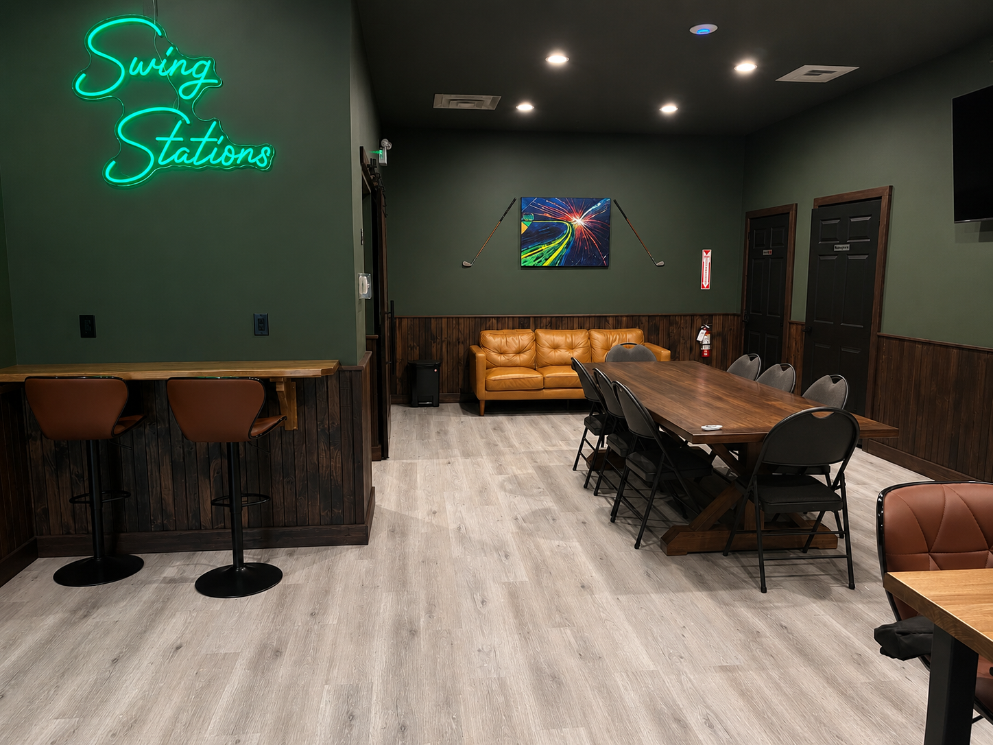 Commercial golf simulator lounge with seating